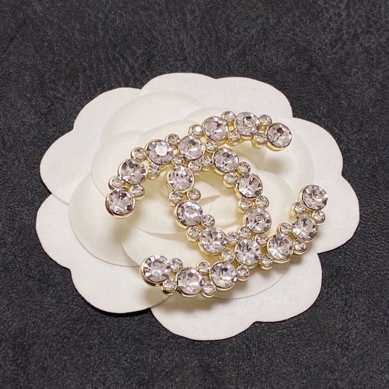 Ch**el brooches